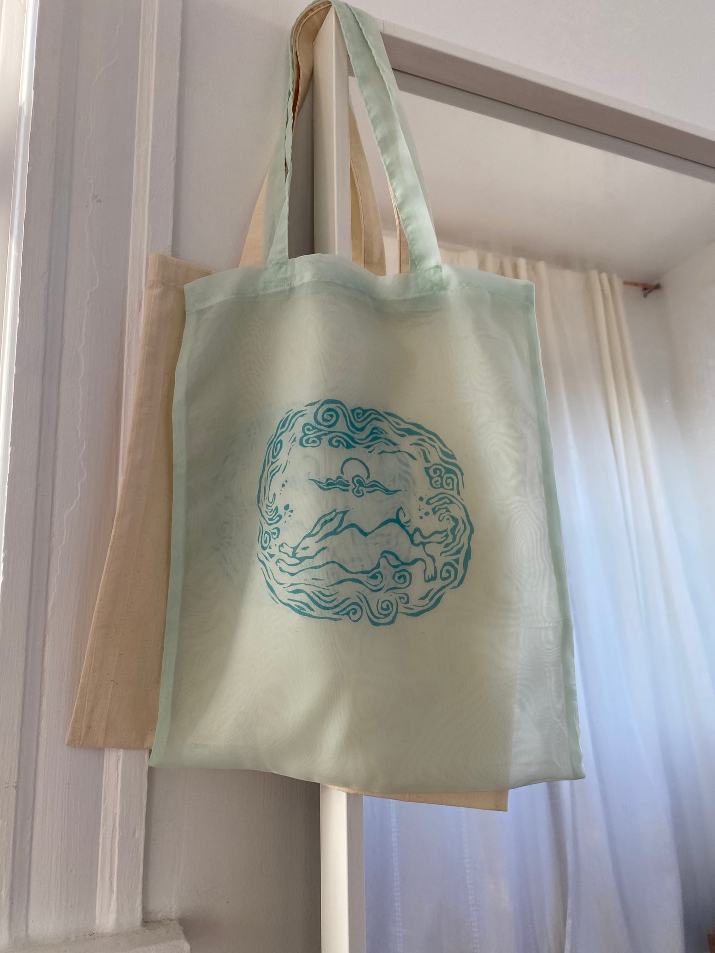 Water Rabbit Tote Bag